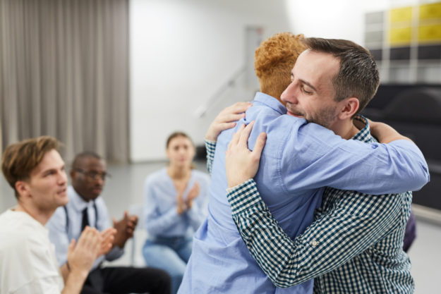 AdobeStock_260159445 (1) man overcoming challenges during addiction recovery